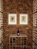 Wine cellar design with stone veneer panels Home wine cellars created with stone veneer panels