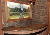 Stone veneer panels installed by the Little River Vineyard Stone veneer paneling used in the wine cellar of The Little River Vineyard in North Carolina.