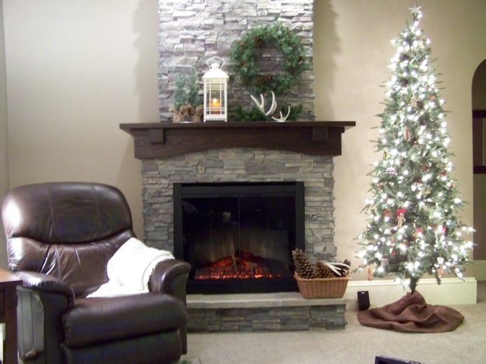 After photo: building a fireplace surround that looks like real stone is easy with FauxPanels.
