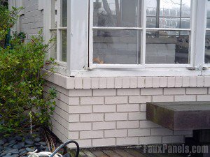 White brick veneer updates another home from the 1920s Brick veneer siding helps restore the exterior of a 1920s house