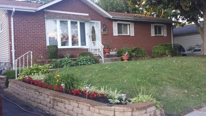 BEFORE: Dee's front exterior was solid red brick.