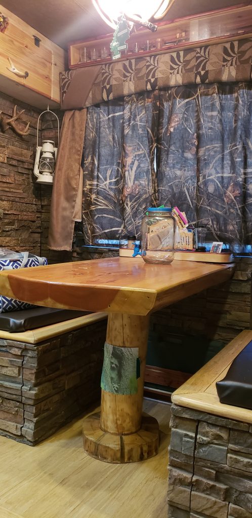 Drystack panels in Earth color installed around an RV's dining area.