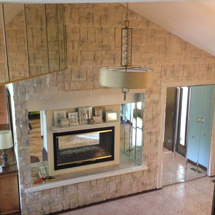 DIY fireplace remodel with Wellington Random Rock panels in the Washed Bisque color.