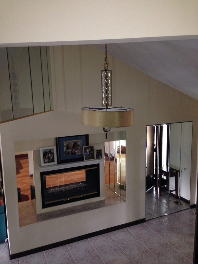 Before photo: fireplace surrounding wall