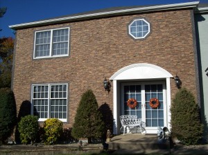 Stacked stone veneer updated this home's exterior at a fraction of the cost.