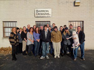 The incredible Customer Service Department, Warehouse team and Web Development team gather for a team photo in honor of 40 years in business.