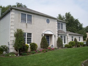 This home's stucco exterior needed an update This home's stucco exterior needed an update