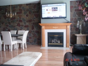 Beautiful faux fieldstone accent wall and fireplace design. Using artificial stone panels like our Carlton Fieldstone can bring an incredible new look to your home that will revitalize and energize the space.