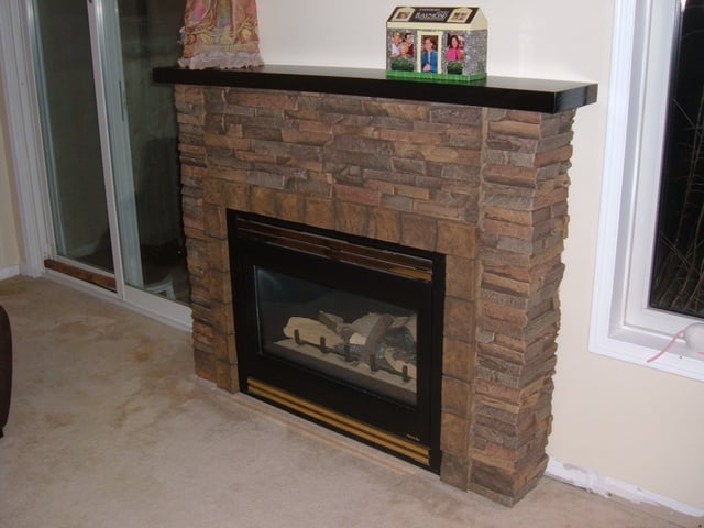 Fireplace facelift complete with a new surround created with Wellington Dry Stack panels.