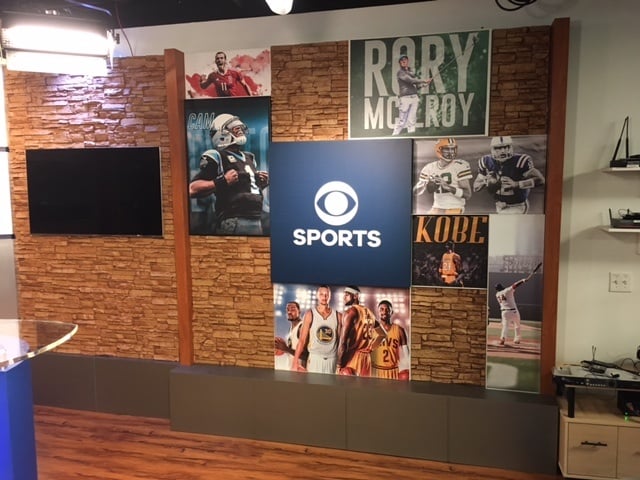 New TV studio background at CBS Sports Networks built with stacked stone style panels