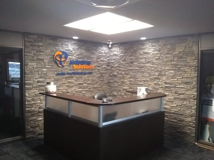 The installation of the panels on walls of the office reception area was textbook, especially around the corners.