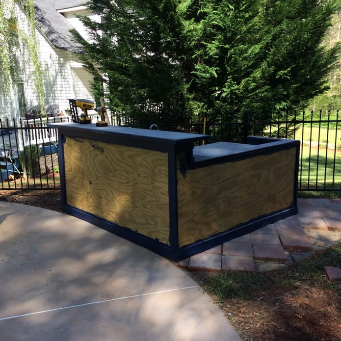 BEFORE: Jeff's poolside kitchen unit.