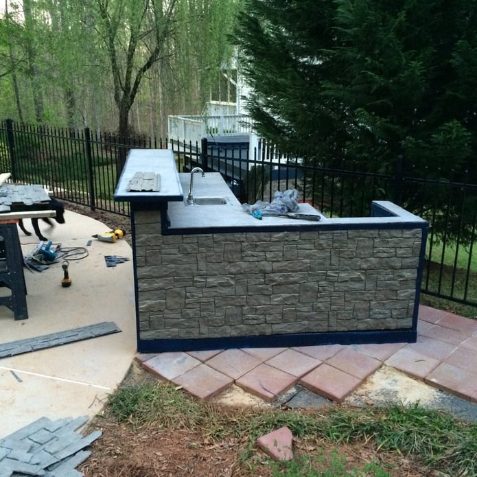 AFTER: Novi panels made the finished product look like a real stone kitchen.