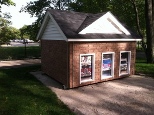 The exterior siding really adds to the realism of the tiny firehouse replica. Realistic looking red brick siding panels add the the beauty and charm of this Safety Town building.