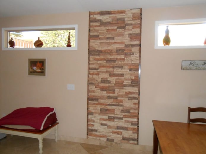 Nancy used granite fixtures to ensure the wall looked contained and complete.