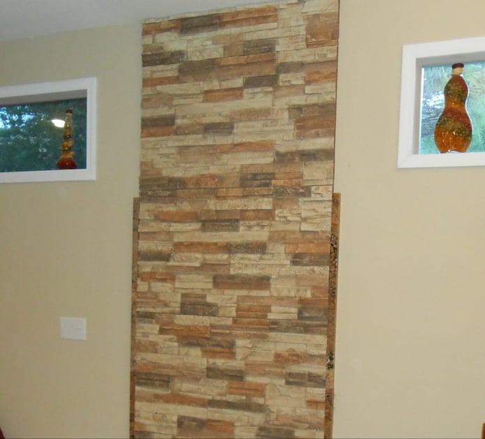 Homeowner covered a reoccurring crack with the wall with Drystack stone panels.