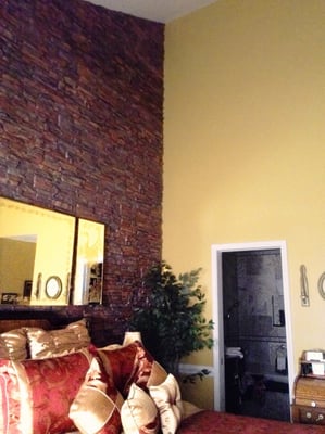 A stacked stone wall brings an amazing difference to any room.