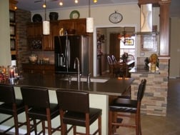 Kitchen with Faux Stone Interior Paneling