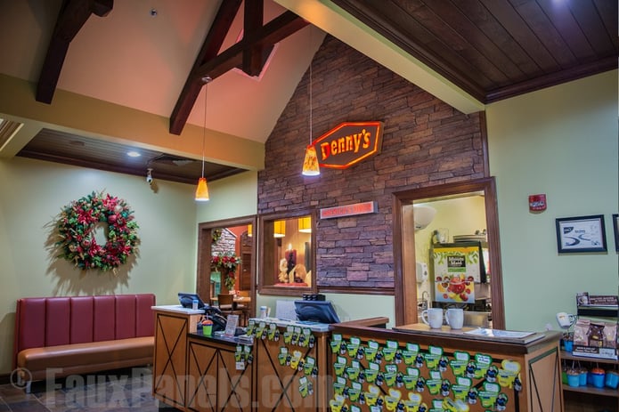 Franchise restaurant interior design gets a comfortable look with artificial stone.