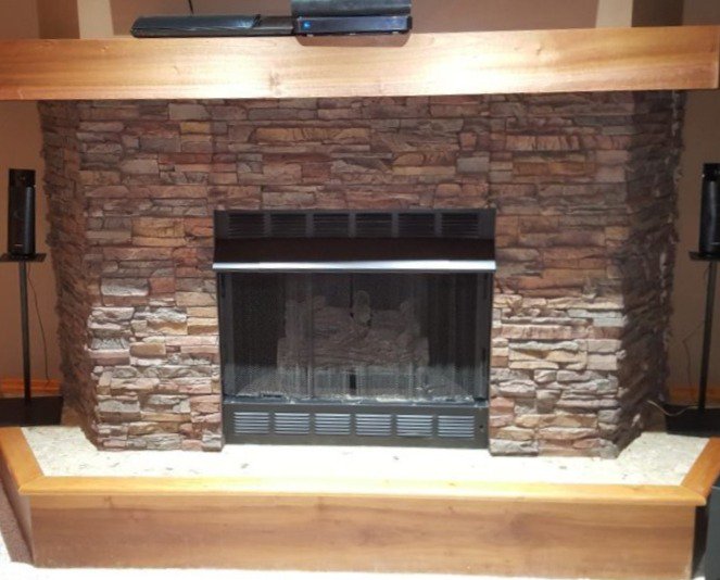 Easy fireplace makeover complete, covered in Regency Stacked Stone panels