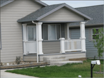 Exterior siding made with Ledgestone fake stone panels makes this house stand out in the neighborhood.