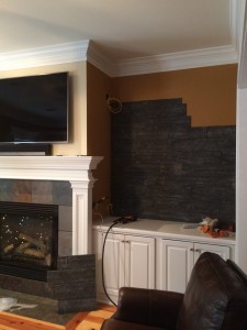 Panels were installed first before the shelving instead of as an after thought.