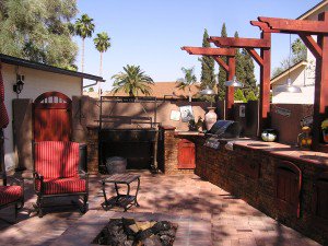 Gorgeous kitchen design outdoors using faux stone panels