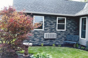 Cutting panels to fit around windows and other elements is a simple process that can be done with most conventional wood cutting tools.