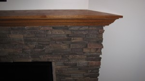 Fireplace facade finished with Dry Stack panels.