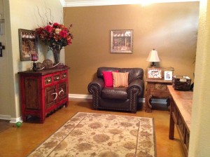 Previously the accent wall was just a flat neutral tone. Before installing the faux stacked stone, Holly had painted the accent wall in the home office but it was quite enough to liven up the space.