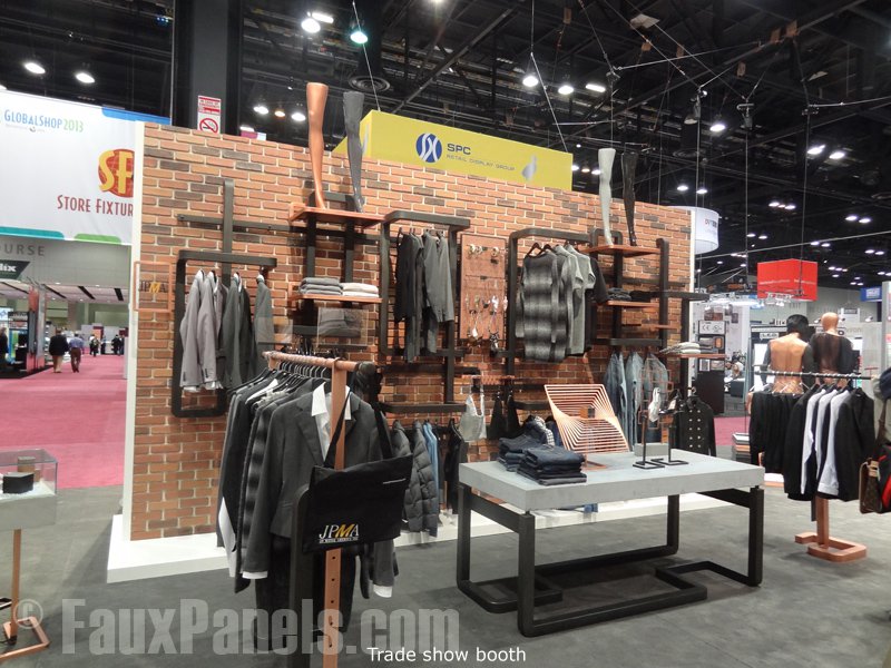 Brick panels on a clothing store's trade show display.