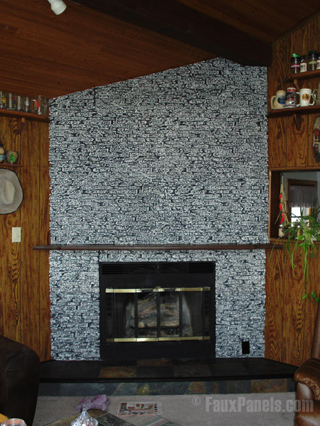 Stacked stone fireplace veneer in light gray