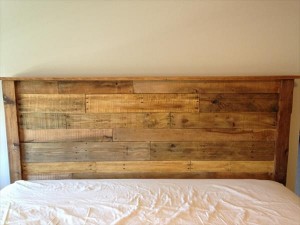 This picture from palletfurniturediy.com shows the sort of headboard Tim's wife was keen on.