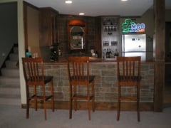 DIY basement bar built by the Flynn family, Irish pub style.