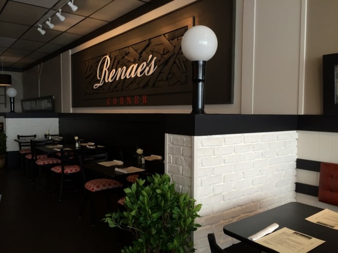 Renae's restaurant renovation got a refreshed look, thanks to artificial brick wall paneling.