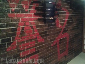 Oriental murals painted on brick panels for a basement remodeling project featured on Man Caves.