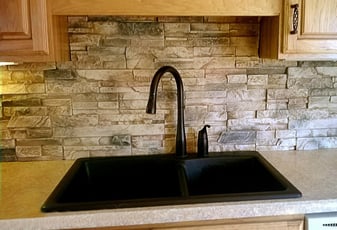 Kitchen backsplash made from faux drystack stone panels