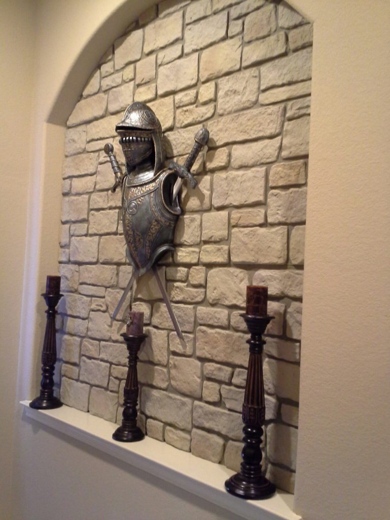 Medieval style wall accent created with Carlton Cobblestone panels in Limestone color.